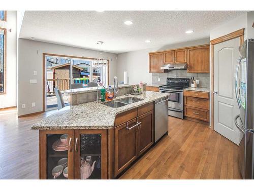 530 Chaparral Drive Se, Calgary, AB - Indoor Photo Showing Kitchen With Double Sink