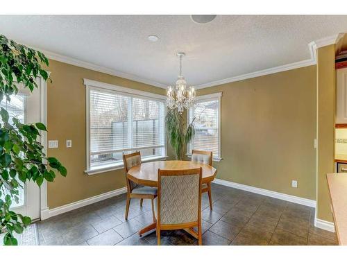 58 Arbour Butte Road Nw, Calgary, AB - Indoor Photo Showing Dining Room