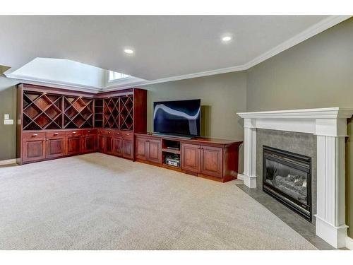 58 Arbour Butte Road Nw, Calgary, AB - Indoor With Fireplace