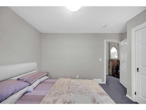 62 Carringham Way Nw, Calgary, AB - Indoor Photo Showing Bedroom