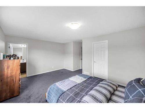 62 Carringham Way Nw, Calgary, AB - Indoor Photo Showing Bedroom