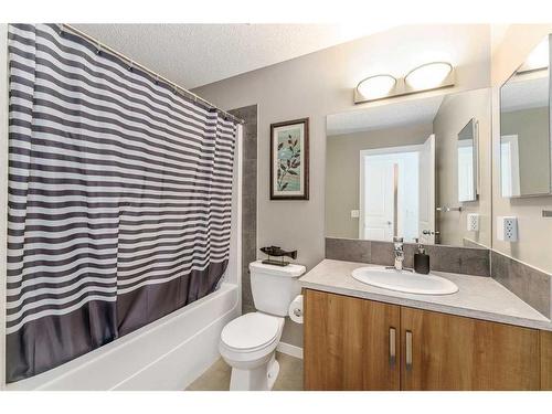 75 New Brighton Point Se, Calgary, AB - Indoor Photo Showing Bathroom