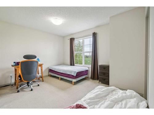 310 Cranford Court Se, Calgary, AB - Indoor Photo Showing Bedroom