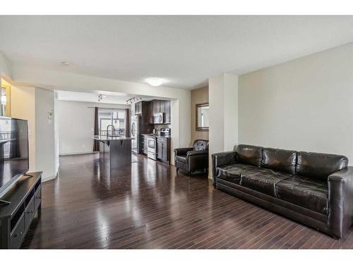310 Cranford Court Se, Calgary, AB - Indoor Photo Showing Living Room