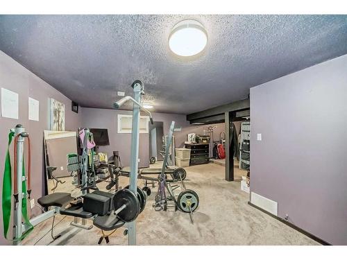 A-2440 53 Avenue Sw, Calgary, AB - Indoor Photo Showing Gym Room