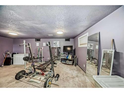 A-2440 53 Avenue Sw, Calgary, AB - Indoor Photo Showing Gym Room
