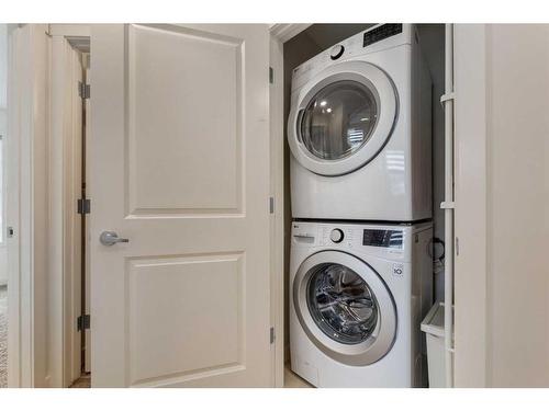 103 Nolanfield Villas Nw, Calgary, AB - Indoor Photo Showing Laundry Room