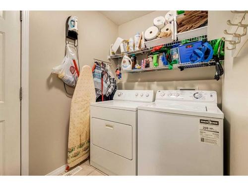122 Royal Birch Rise Nw, Calgary, AB - Indoor Photo Showing Laundry Room