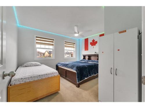 104 Saddlecrest Green Ne, Calgary, AB - Indoor Photo Showing Bedroom
