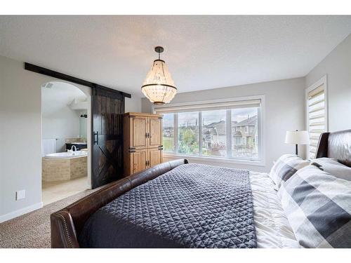 59 Tuscany Glen Place Nw, Calgary, AB - Indoor Photo Showing Bedroom