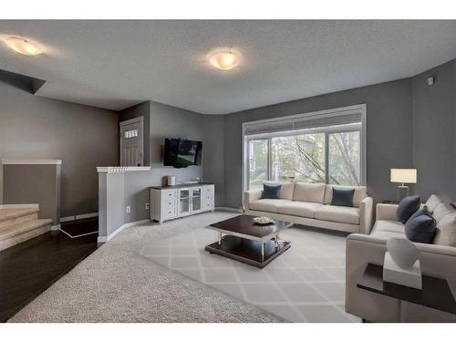 220 Autumn Green Se, Calgary, AB - Indoor Photo Showing Living Room