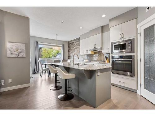 505 Cranford Drive Se, Calgary, AB - Indoor Photo Showing Kitchen With Upgraded Kitchen