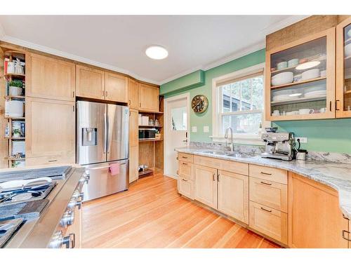 436 Muskrat Street, Banff, AB - Indoor Photo Showing Kitchen With Double Sink