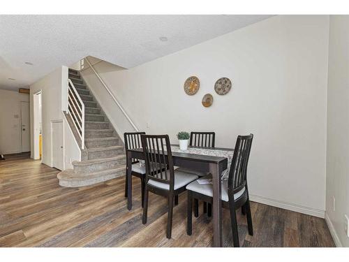 201-140 26 Avenue Nw, Calgary, AB - Indoor Photo Showing Living Room With Fireplace