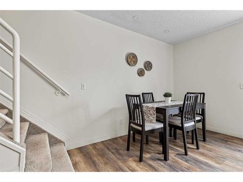 201-140 26 Avenue Nw, Calgary, AB - Indoor Photo Showing Living Room With Fireplace