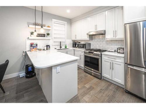 1404 29 Street Sw, Calgary, AB - Indoor Photo Showing Kitchen With Stainless Steel Kitchen