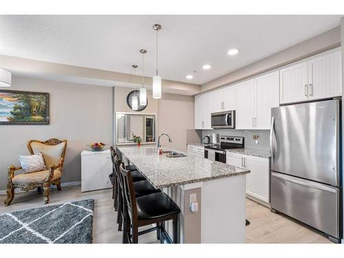 201-30 Mahogany Mews Se, Calgary, AB - Indoor Photo Showing Kitchen With Stainless Steel Kitchen With Upgraded Kitchen