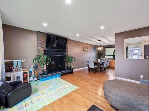 960 Bracewood Rise Sw, Calgary, AB - Indoor With Fireplace