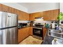 1320-1140 Taradale Drive Ne, Calgary, AB  - Indoor Photo Showing Kitchen With Double Sink 