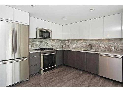 305-560 6 Avenue Se, Calgary, AB - Indoor Photo Showing Kitchen With Stainless Steel Kitchen With Upgraded Kitchen