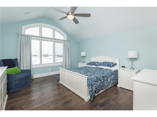 38 Waters Edge Drive, Heritage Pointe, AB - Indoor Photo Showing Bedroom