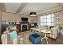 38 Waters Edge Drive, Heritage Pointe, AB  - Indoor Photo Showing Living Room With Fireplace 