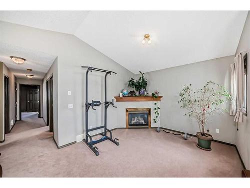 10 Royal Elm Drive Nw, Calgary, AB - Indoor With Fireplace