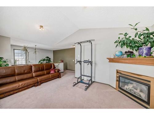 10 Royal Elm Drive Nw, Calgary, AB - Indoor With Fireplace