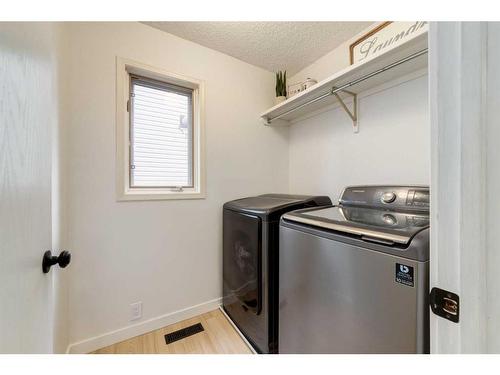 82 Riverbend Drive Se, Calgary, AB - Indoor Photo Showing Laundry Room