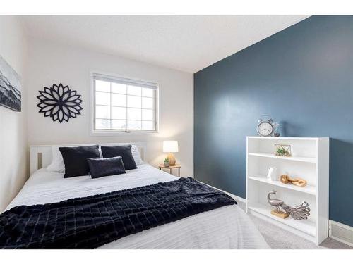 82 Riverbend Drive Se, Calgary, AB - Indoor Photo Showing Bedroom