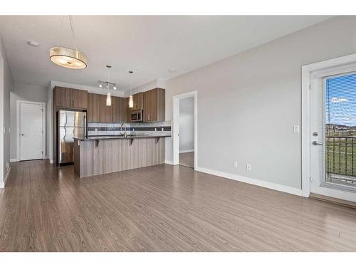 202-4 Sage Hill Terrace Nw, Calgary, AB - Indoor Photo Showing Kitchen