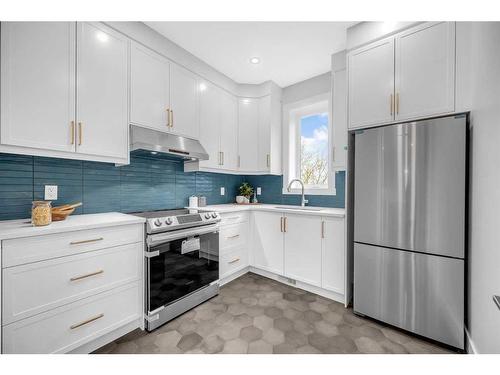 49 Rockhaven Green Nw, Calgary, AB - Indoor Photo Showing Kitchen With Stainless Steel Kitchen With Upgraded Kitchen