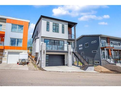49 Rockhaven Green Nw, Calgary, AB - Outdoor With Balcony With Facade