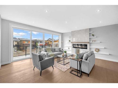 49 Rockhaven Green Nw, Calgary, AB - Indoor Photo Showing Living Room With Fireplace