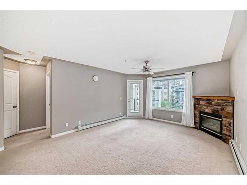 303-369 Rocky Vista Park Nw, Calgary, AB - Indoor With Fireplace