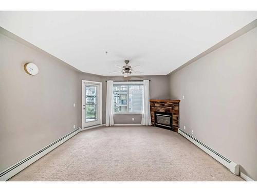 303-369 Rocky Vista Park Nw, Calgary, AB - Indoor With Fireplace