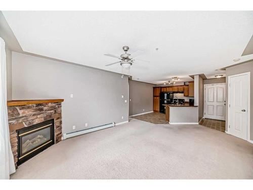 303-369 Rocky Vista Park Nw, Calgary, AB - Indoor With Fireplace