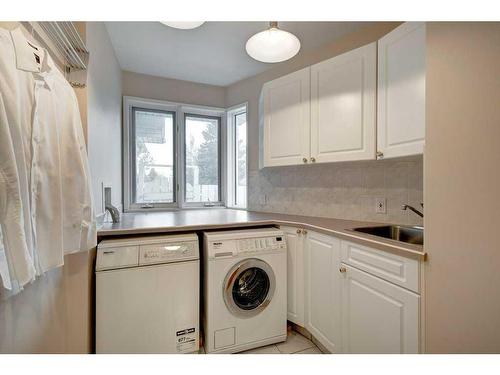 143 Parkview Green Se, Calgary, AB - Indoor Photo Showing Laundry Room