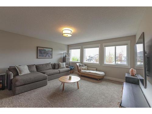 444 Auburn Shores Landing Se, Calgary, AB - Indoor Photo Showing Living Room