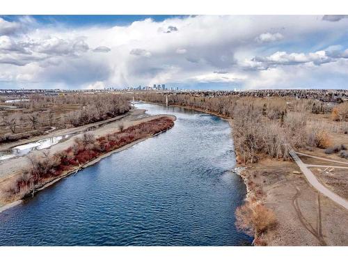 106-201 Quarry Way Se, Calgary, AB - Outdoor With Body Of Water With View