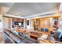 106-201 Quarry Way Se, Calgary, AB  - Indoor Photo Showing Living Room 