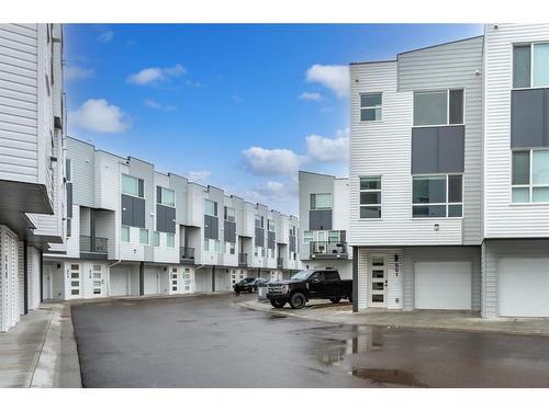 501-101 Panatella Square Nw, Calgary, AB - Outdoor With Balcony With Facade