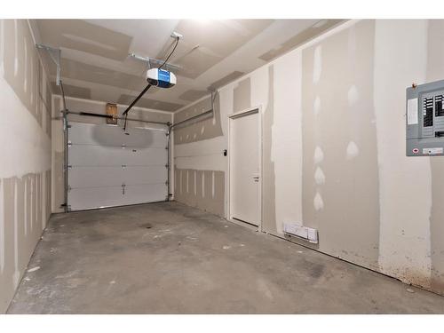 501-101 Panatella Square Nw, Calgary, AB - Indoor Photo Showing Garage