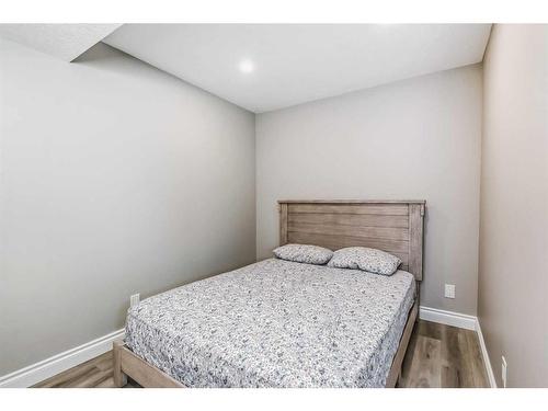 118 Windrow Link Sw, Airdrie, AB - Indoor Photo Showing Bedroom