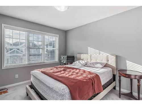 118 Windrow Link Sw, Airdrie, AB - Indoor Photo Showing Bedroom