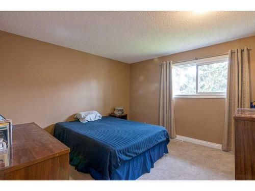127 Rundleview Drive Ne, Calgary, AB - Indoor Photo Showing Bedroom