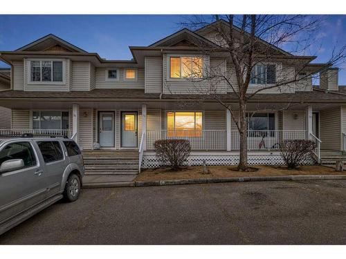 59-4 Stonegate Drive Nw, Airdrie, AB - Outdoor With Facade