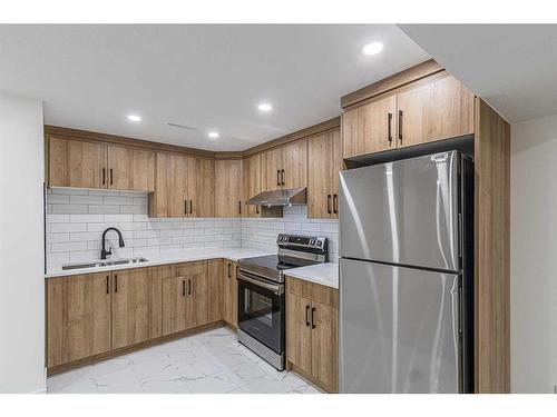 1447 Mardale Way Ne, Calgary, AB - Indoor Photo Showing Kitchen With Stainless Steel Kitchen With Double Sink