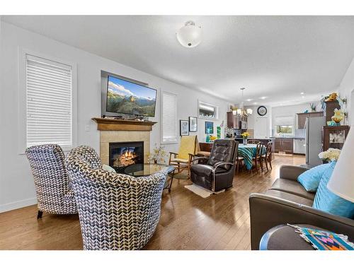 18 Violet Close, Olds, AB - Indoor Photo Showing Living Room With Fireplace