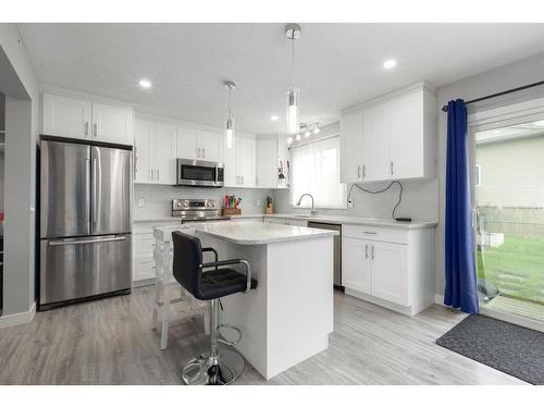 2421 146 Avenue Se, Calgary, AB - Indoor Photo Showing Kitchen With Upgraded Kitchen